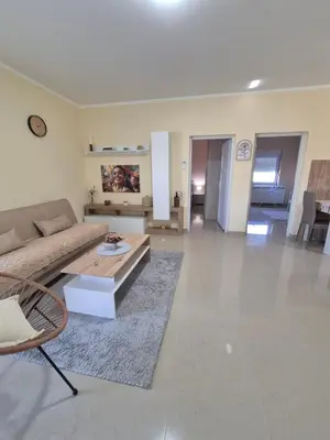 a living room with a couch and a coffee table at Rio Apartmani Ub in Ub