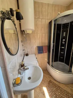 a bathroom with a sink and a mirror at Rio Apartmani Ub in Ub