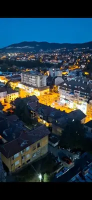 an overhead view of a city at night at Apartman Horizont in Arandjelovac