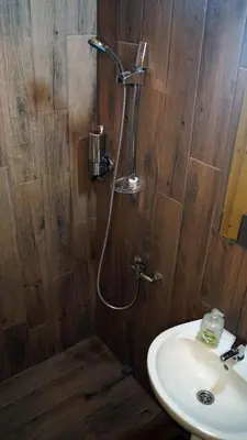 a bathroom with a shower and a sink at La dolce vita in Inđija