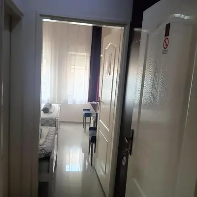 an open door to a room with a bedroom at Vila Eni in Smederevo