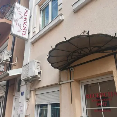 a building with an umbrella over a window at Vila Eni in Smederevo