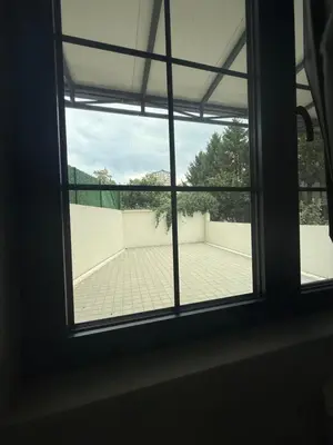 a window in a room with a view of a patio at Amar3 in Belgrade