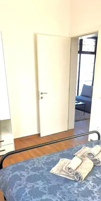 a room with a bed with towels on it at Amar 1 in Belgrade