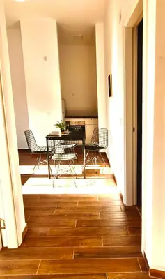 a dining room with a table and chairs at Amar 1 in Belgrade