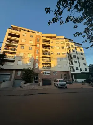 a building with a car parked in front of it at Amar3 in Belgrade