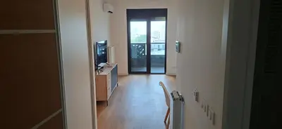 a hallway with a door leading to a room at Park Vila apartment in Belgrade