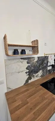 a counter with three pots on top of it at Admiral Suite in Belgrade