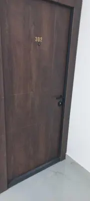 a wooden door with the number on it at All SEASON in Beograd