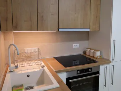 a kitchen with a sink and a counter top at Apartman ANDJA in Smederevo