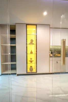 a display case in a room with glass doors at Villa Cocosinella Belgrade in Surčin
