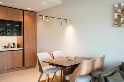 a dining room with a table and chairs at Star West Luxury in Belgrade
