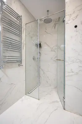 a shower with a glass door in a bathroom at Star West Luxury in Belgrade
