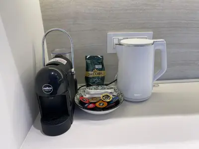 a counter top with a coffee maker and a blender at Beldorado Apartments - Belgrade Waterfront Azure Studio in Belgrade
