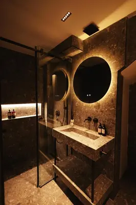 a bathroom with a sink and a mirror at Like a therapy VILLA in Krčedin