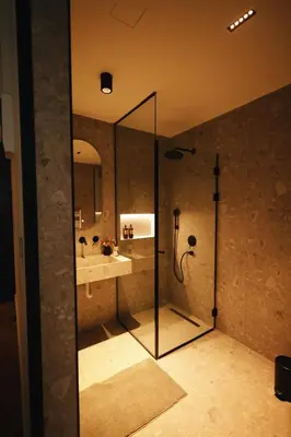 a bathroom with a shower and a sink at Like a therapy VILLA in Krčedin