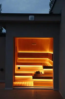 a building with a bench with lights on it at Like a therapy VILLA in Krčedin