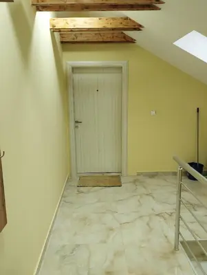 a room with a white door and a ceiling at Belgrade City Home in Belgrade