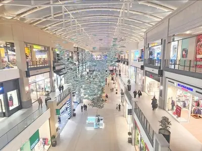 an overhead view of a shopping mall with a chandelier at Eterna Premium Apartment 1 Bedroom in Sajmište