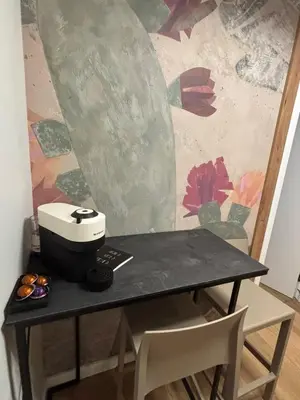 a table with a sewing machine on top of it at Belgrade Nest in Belgrade