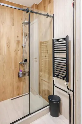 a shower with a glass door in a bathroom at Belgrade Nest in Belgrade