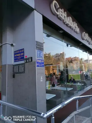 a store front with a large glass window at City pioneer Apartmens in Belgrade
