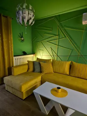 a living room with a couch and a table at 1 Bedroom Apartment Belgrade in Belgrade
