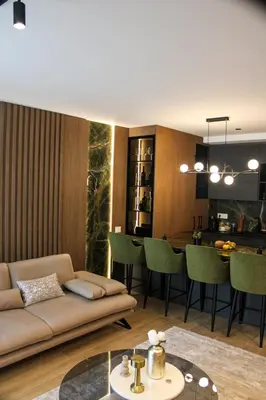 a living room with a couch and a table at Luxurious 2BR Designer Apartment Near River & Park in Belgrade