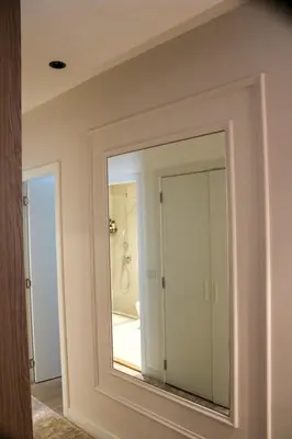 a mirror in a bathroom with a shower at Luxurious 2BR Designer Apartment Near River & Park in Belgrade