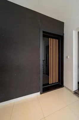 an empty room with a black wall and a door at Forty One Luxury Spa in Belgrade