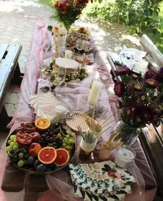 a table with fruits and plates of food on it at ART HOUSE Kosmaj 1 in Sopot