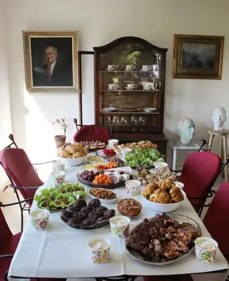 a table with many different types of food on it at ART HOUSE Kosmaj 2 in Sopot