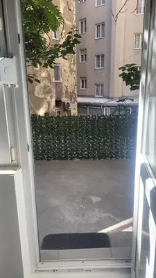 an open door with a view of a building at Apartment 20 in Belgrade