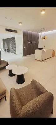 a living room with a couch and a table at BW QUARTET Apartman-whit free garage parking in Belgrade