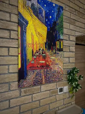 a painting on a wall of a street at night at Maison Dositej No20 in Belgrade
