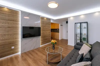 a living room with a couch and a table at Marshal Autokomanda in Belgrade