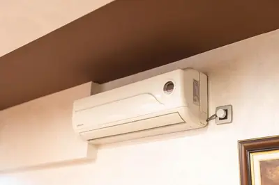 a security camera on the wall of a hotel room at Arena public FREE parking in front of building in Belgrade