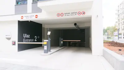 an entrance to a building with a parking meter at Belgrade Waterfront - Free Parking - Echo in Belgrade