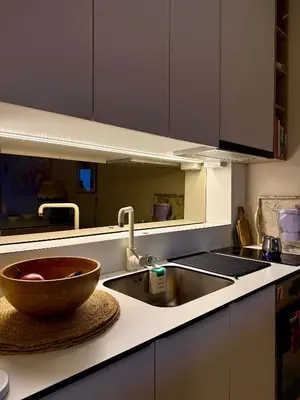 a kitchen with a sink and a bowl on a counter at Cozy Luxury Studio with City View in Belgrade