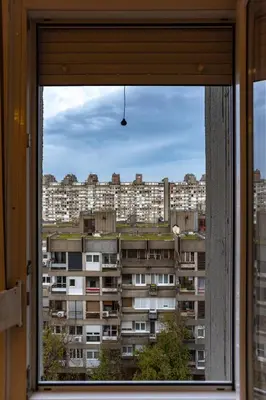 a window with a view of a large building at Echo Arena in Belgrade