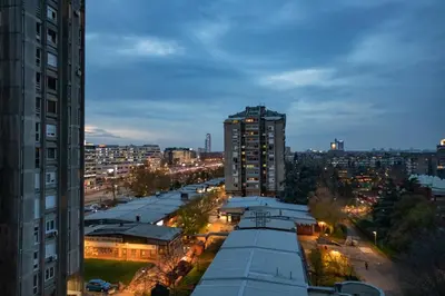 a view of a city at night with buildings at Echo Arena in Belgrade