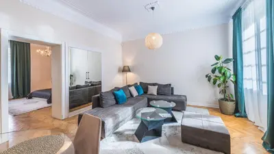 a living room with a couch and a table at Central Harmony Apartments 1 in Belgrade