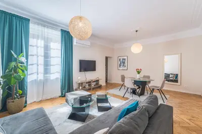 a living room with a couch and a table at Central Harmony Apartments 1 in Belgrade