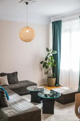 a living room with a couch and a table at Central Harmony Apartments 1 in Belgrade
