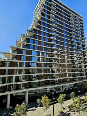 a large apartment building with a lot of windows at BW Maša in Belgrade