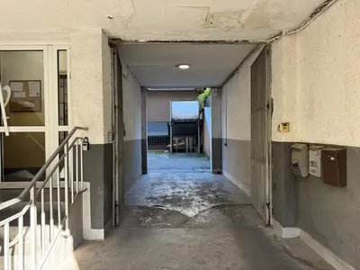 an empty hallway in an old building with a staircase at Anywhere on Foot - FREE Parking in Belgrade