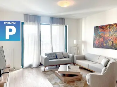 a living room with a couch and a table at Metropoliten - Aria Lux Apartments BW in Belgrade