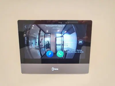 a tablet computer on a wall with the screen on at Simphonia Lux Apartments BW in Belgrade