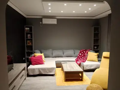 a living room with a couch and a table at Central Point Belgrade in Belgrade