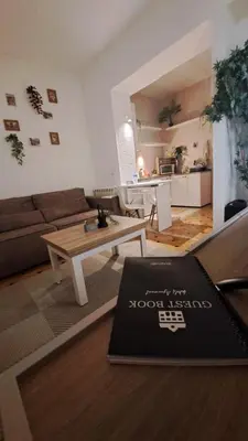 a living room with a couch and a coffee table at Wolf Belgrade in Belgrade